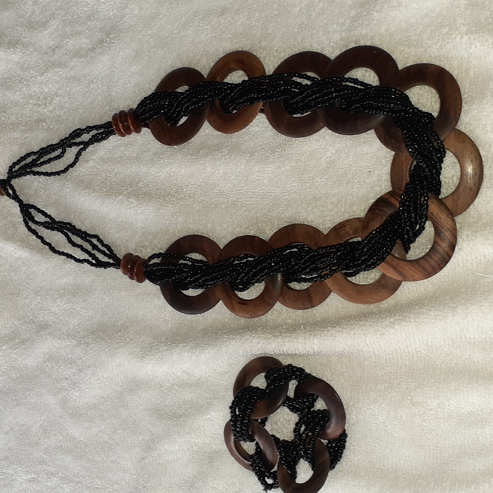Beaded brown and black necklace and matching bracelet.